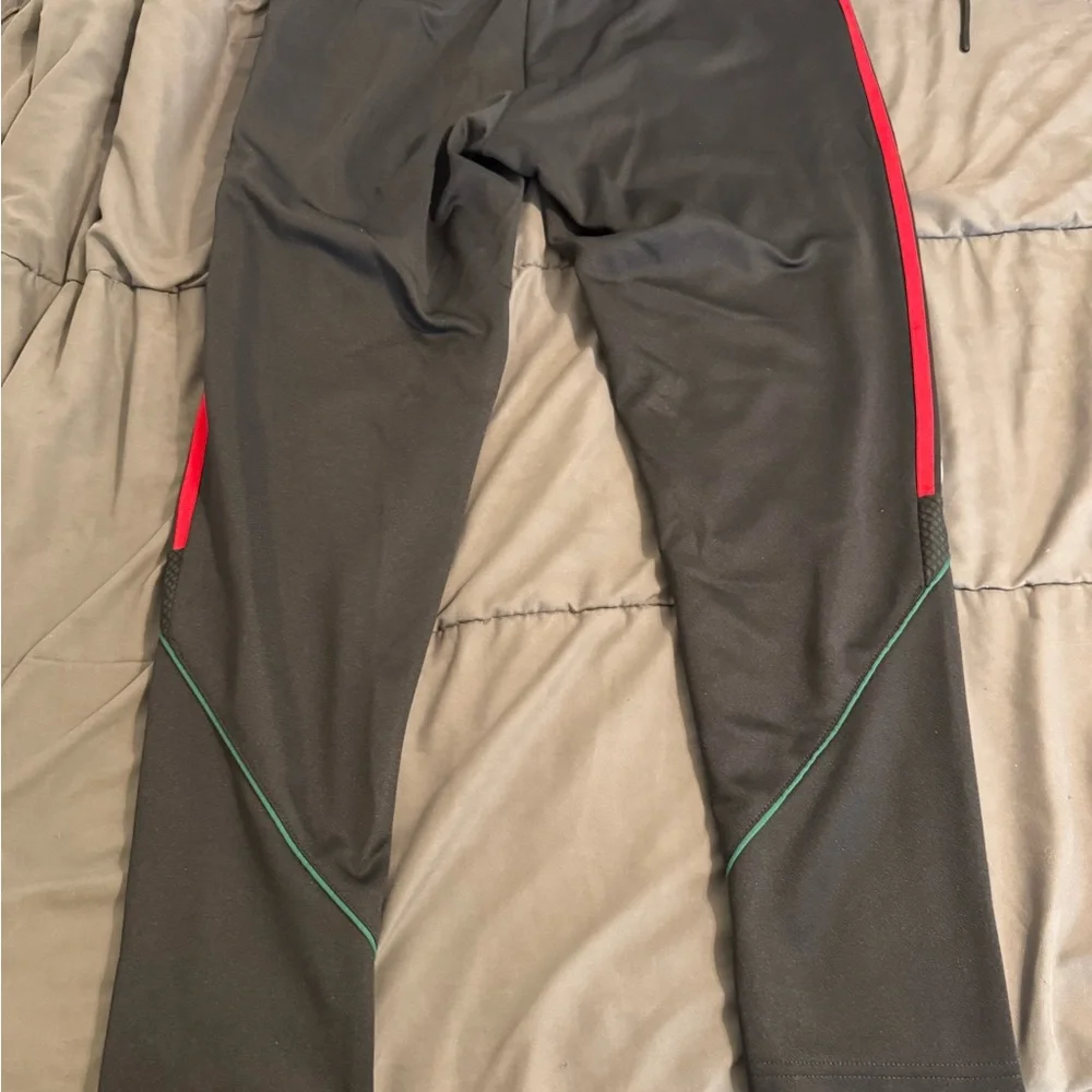Adidas Black Track Pants with Green, White, and Red Stripes - Picture 2 of 2